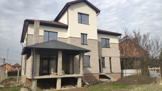 Коттедж 339 кв.м. 3 этажа 10 соток